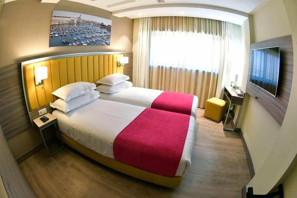 Tulip Inn Naya Algiers Quarto foto